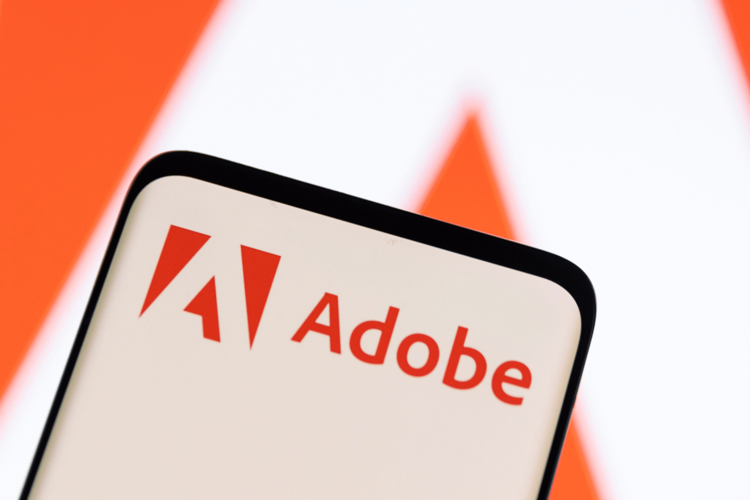 Adobe surges as optimism about AI drives the annual revenue estimate